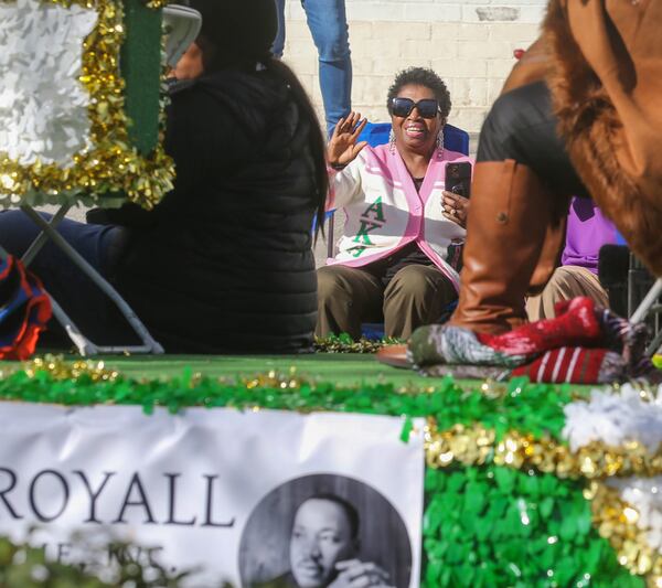 Lucille Brown enjoys the parade as it passes along MLK, Jr Boulevard during the annual Savannah MLK Day Parade on Monday, January 15, 2024.