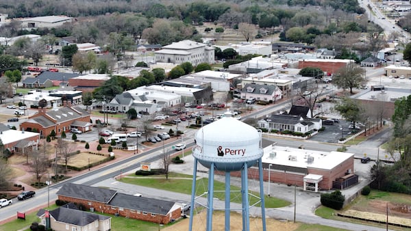 An aerial image shows part of the downtown area in Perry, Georgia, on Thursday, February 13, 2025. The area features diverse businesses and shops, reflecting ongoing developments in this historic downtown location.
(Miguel Martinez/ AJC)