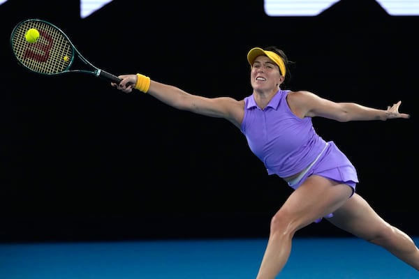 Anastasia Pavlyuchenkova of Russia plays a forehand return to Aryna Sabalenka of Belarus during their quarterfinal match at the Australian Open tennis championship in Melbourne, Australia, Tuesday, Jan. 21, 2025. (AP Photo/Manish Swarup)