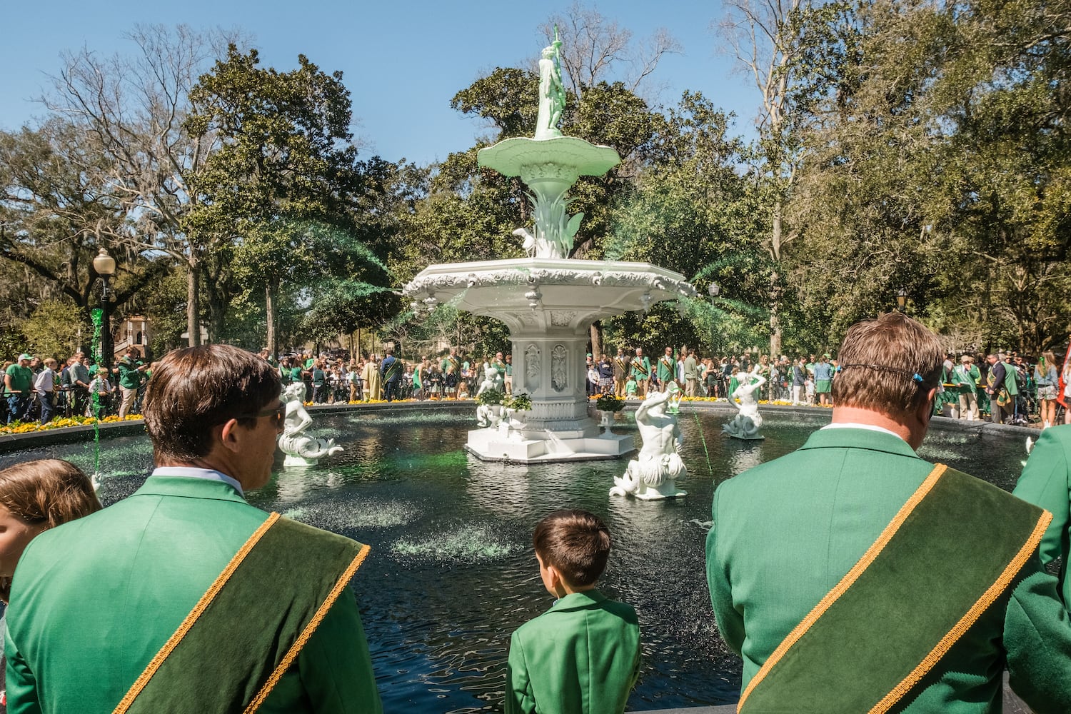 Members of the 2025 St. Patrick’s Day Parade Committee pour green dye into the fountain in Forsyth Park on March 7, 2025 in Savannah, GA. The dying of the fountain marks the beginning of the city’s St. Patrick’s Day festivities. (Justin Taylor/The Atlanta Journal Constitution)