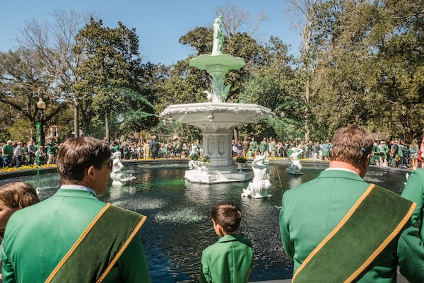 Members of the 2025 St. Patrick’s Day Parade Committee pour green dye into the fountain in Forsyth Park on March 7, 2025 in Savannah, GA. The dying of the fountain marks the beginning of the city’s St. Patrick’s Day festivities. (Justin Taylor/The Atlanta Journal Constitution)