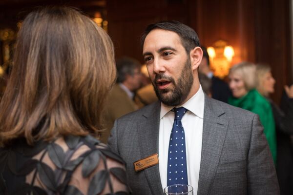 Dov Wilker, regional director of the American Jewish Committee’s Atlanta office, speaks with one of the AJC’s board members during the organization’s 75th anniversary kickoff celebration in Atlanta. CONTRIBUTED BY JACOB ROSS