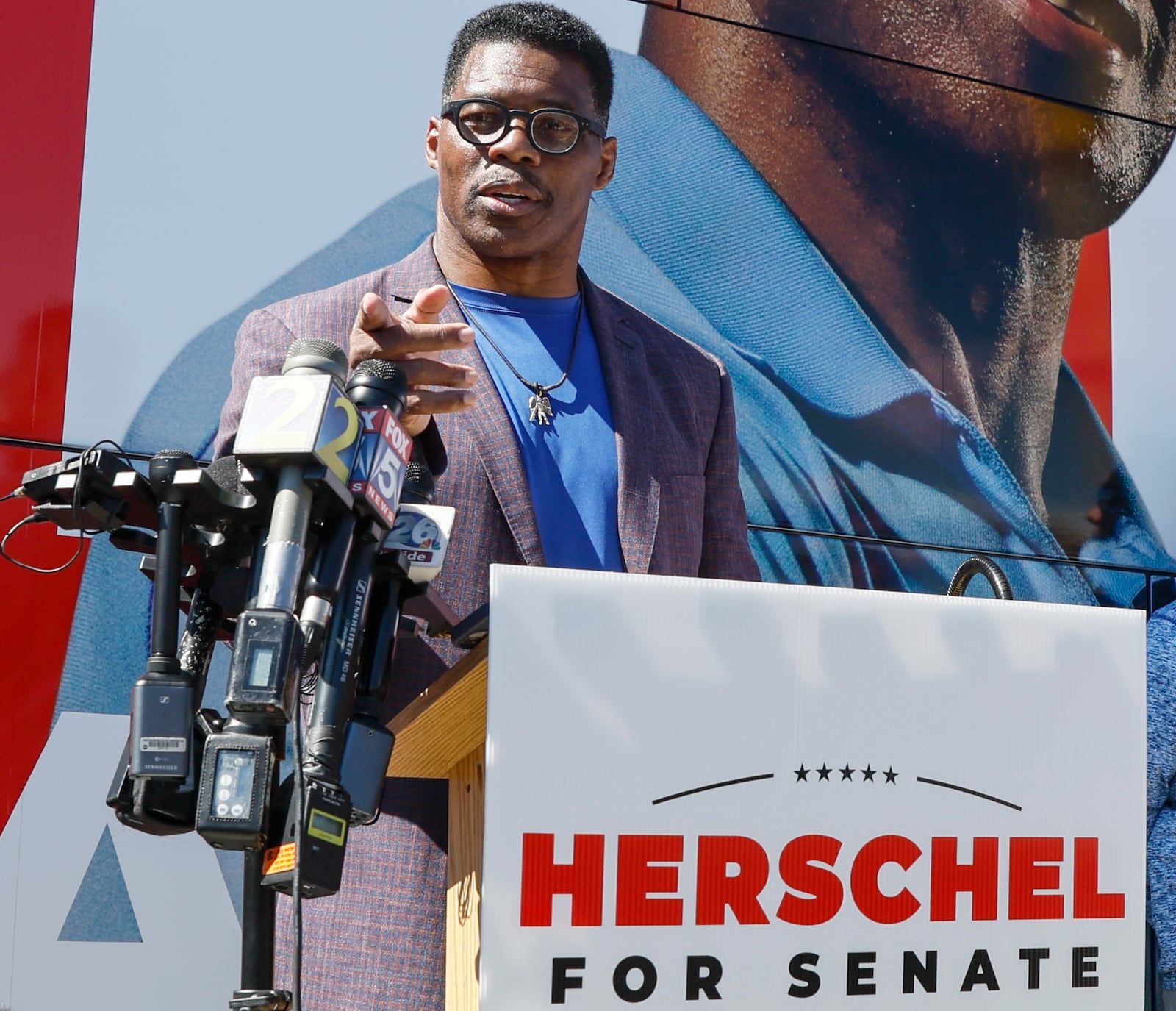 Republican U.S. Senate candidate Herschel Walker talks to the media at Battle Lumber Company in Wadley, Georgia, on Thursday, October 6, 2022. (Natrice Miller/natrice.miller@ajc.com)  