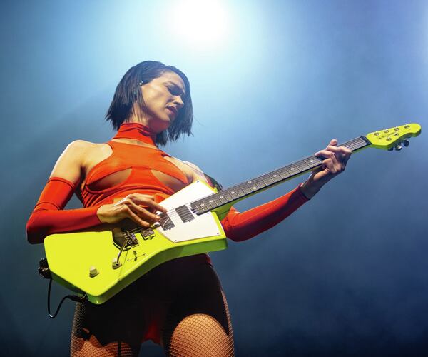 The exhibit “Wire & Wood: Designing Iconic Guitars” features musician St. Vincent, a.k.a. Annie Clark whose guitar is on view. Photo credit Ernie Ball