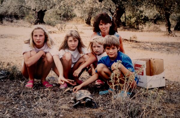 A repro of a photo pictured in Egelsbach, Germany, Thursday, Oct. 31, 2024 shows Claudia Huth and her children. (AP Photo/Michael Probst)