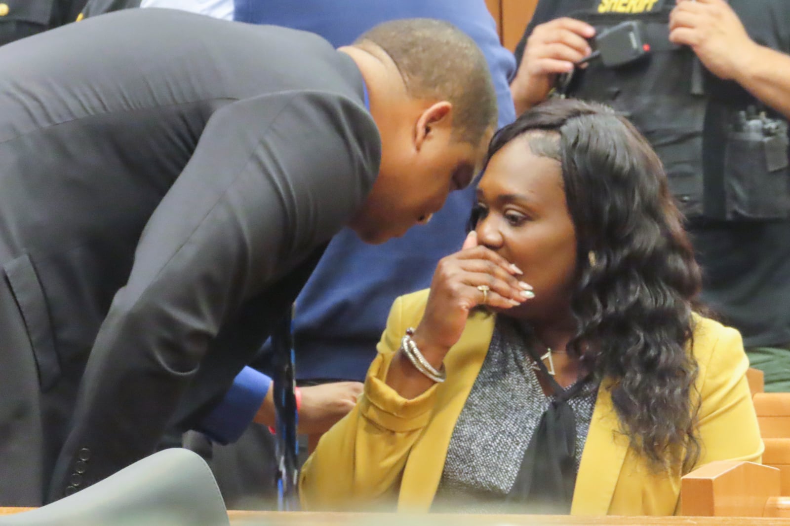 Atlantic City Mayor Marty Small Sr. speaks with his wife La'Quetta Small, the city's superintendent of schools, as they wait for their court appearance to start on charges that they beat and abused their teenage daughter, in Mays Landing, N.J., Thursday, Oct. 10, 2024. (AP Photo/Wayne Parry)