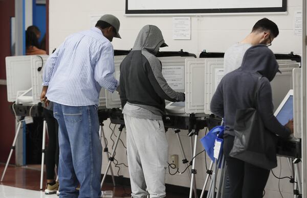 Not all of the voting machines were working at Pittman Park. The wait time to vote at the Pittman Park precinct in Atlanta was reported to be three hours. Pizza and snacks were donated for the people waiting in line. BOB ANDRES / BANDRES@AJC.COM