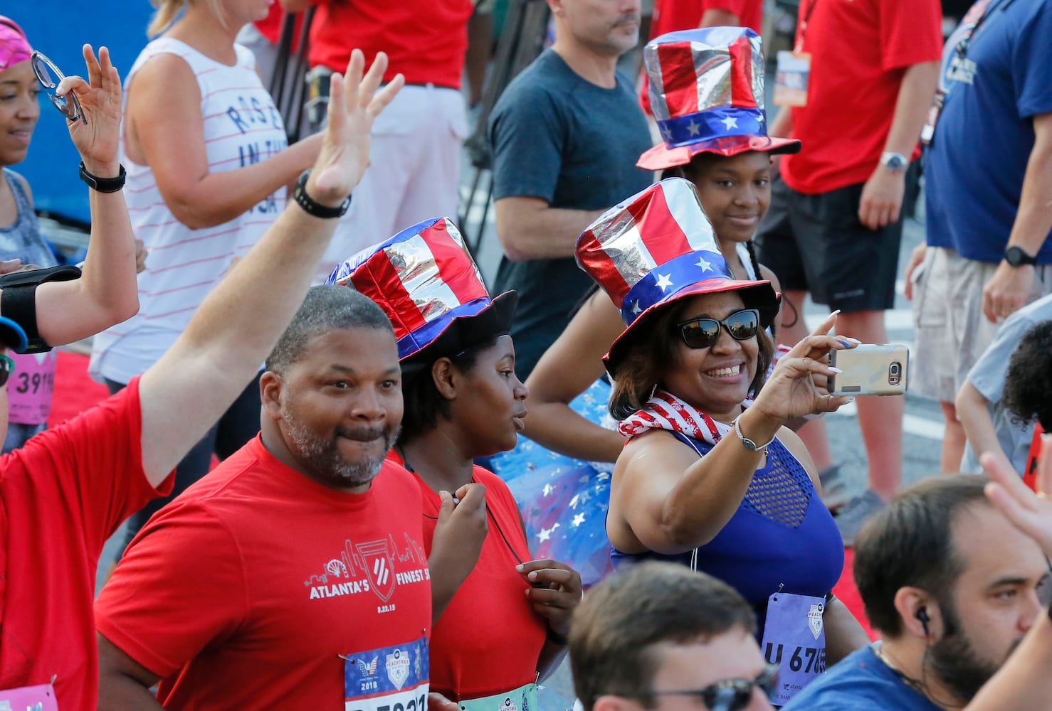 Runners show fashion flair during AJC Peachtree Road Race