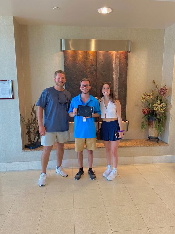 Left to right: William Moore, Sam Lilley and Kaitlin Sells pose for a photo to celebrate Sam Lilley reaching the 1,500 flight hours required to become an airline pilot with a flight in Savannah, Georgia in August 2022. Source: Kaitlin Sells