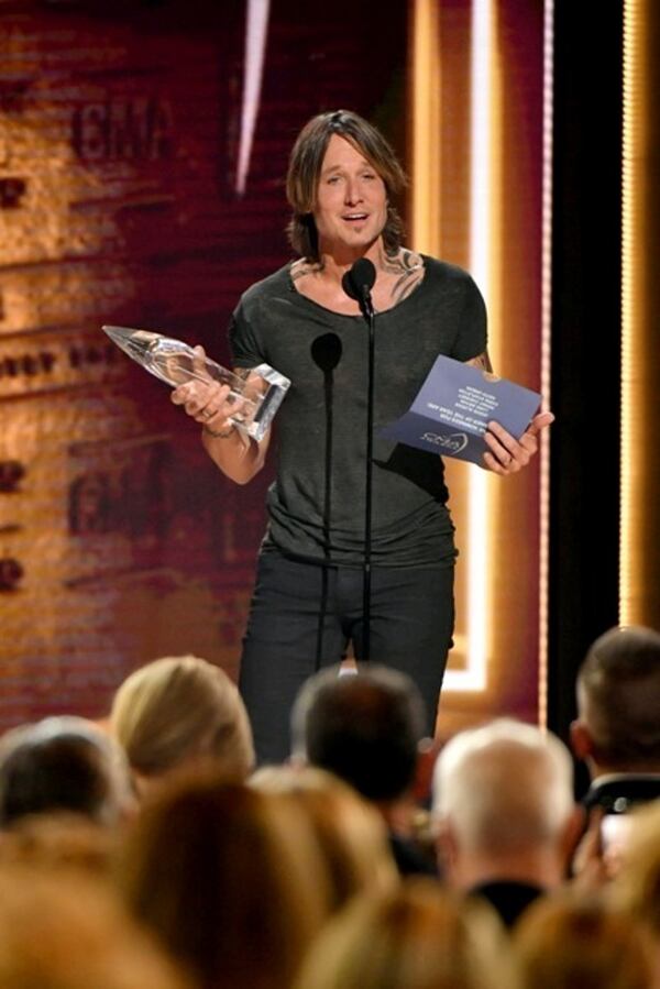 A visibly shocked Keith Urban won Entertainer of the Year at the CMA Awards for only the second time in his career.