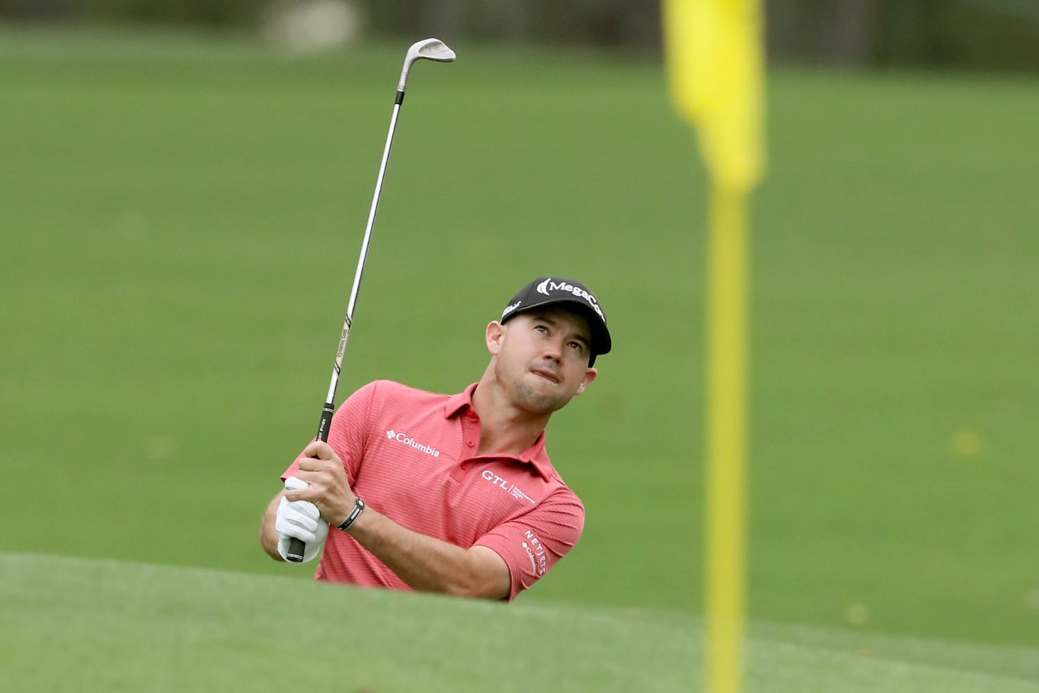 April 10, 2021, Augusta: Brian Harman chips toward the eighth green during the third round of the Masters at Augusta National Golf Club on Saturday, April 10, 2021, in Augusta. Curtis Compton/ccompton@ajc.com