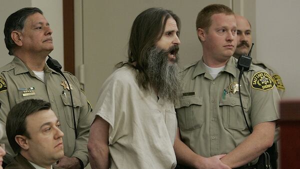 Brian David Mitchell, in shackles, sings a hymn before being removed from the courtroom during his competency hearing Wednesday, Feb. 16, 2005, in Salt Lake City. Mitchell, who kidnapped Elizabeth Smart from her bedroom in 2002, was sentenced in 2011 to life in federal prison.