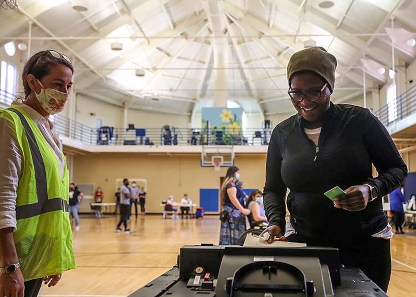 PHOTOS: Georgia voters struggle with long lines, new equipment, social distancing