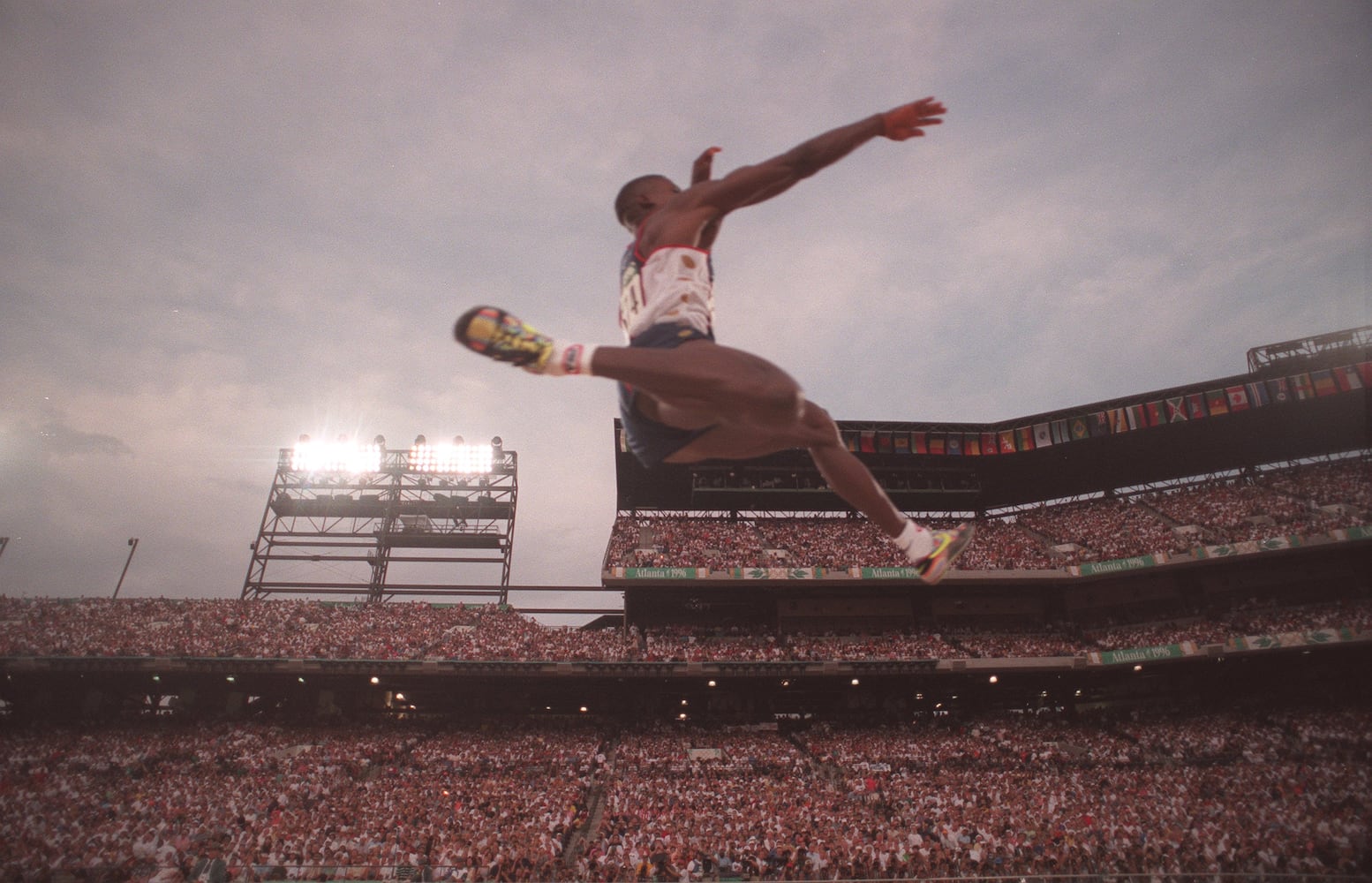 Carl Lewis wins the long jump