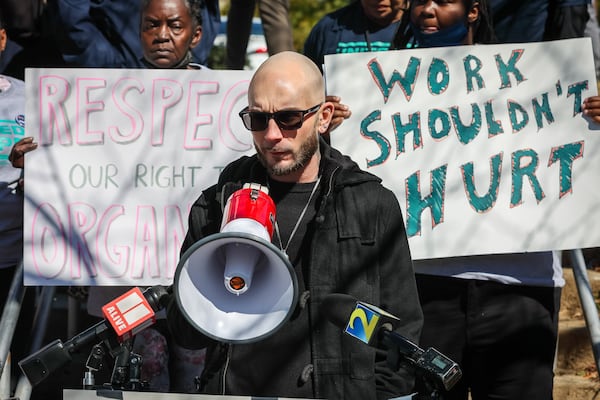 Former Amazon employee Brandon Callaway speaks at a press conference and demonstration at Amazon’s East Point (ATL6) warehouse where workers and allies announced the filing of multiple unfair labor practice charges at their facility in on Wednesday, October 19, 2022. (Arvin Temkar / arvin.temkar@ajc.com)