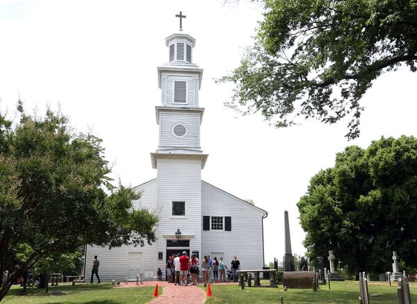 FILE - Visitors line up to enter St. John's Church to hear a re-enactment of Patrick Henry's famous "Liberty or Death" speech, on June 28, 2014, in Richmond, Va. (AP Photo/Richmond Times-Dispatch, P. Kevin Morley, File)