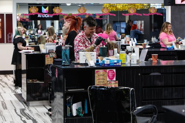 Hairstylists in the technical department color hair at Three-13 Salon, Spa & Boutique in Marietta on Wednesday, March 13, 2024. (Natrice Miller/ Natrice.miller@ajc.com)