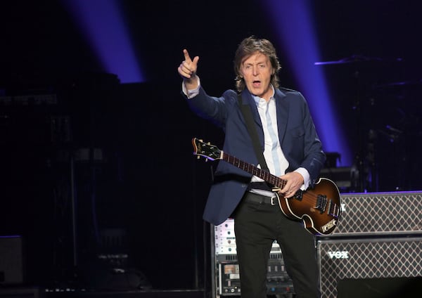 Oct. 15, 2014 ATLANTA: The legendary Sir Paul McCartney performing at the Philips Arena in Atlanta Wednesday. McCartney performed a mix of Beatle classics like "Eight Days a Week," and from his solo career, including his most recent and 16th album, "New." (Akili-Casundria Ramsess/Special to the AJC) Paul McCartney frequently engaged the crowd with acknowledgements and smiles. Photo: Akili-Casundria Ramsess/Special to the AJC