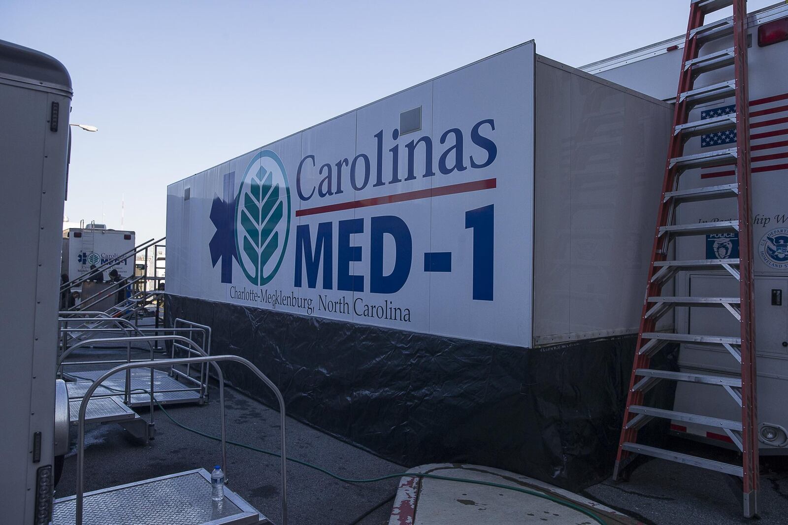 This file photo shows the exterior of Carolinas MED-1 (right), a mobile medical facility located outside at Grady Memorial Hospital in Atlanta. It is back for third consecutive year. (ALYSSA POINTER/ALYSSA.POINTER@AJC.COM)