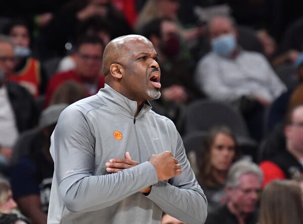 Hawks coach Nate McMillan shouts instructions during the second half in an NBA basketball game at State Farm Arena on Friday, December 17, 2021.  (Hyosub Shin / Hyosub.Shin@ajc.com)