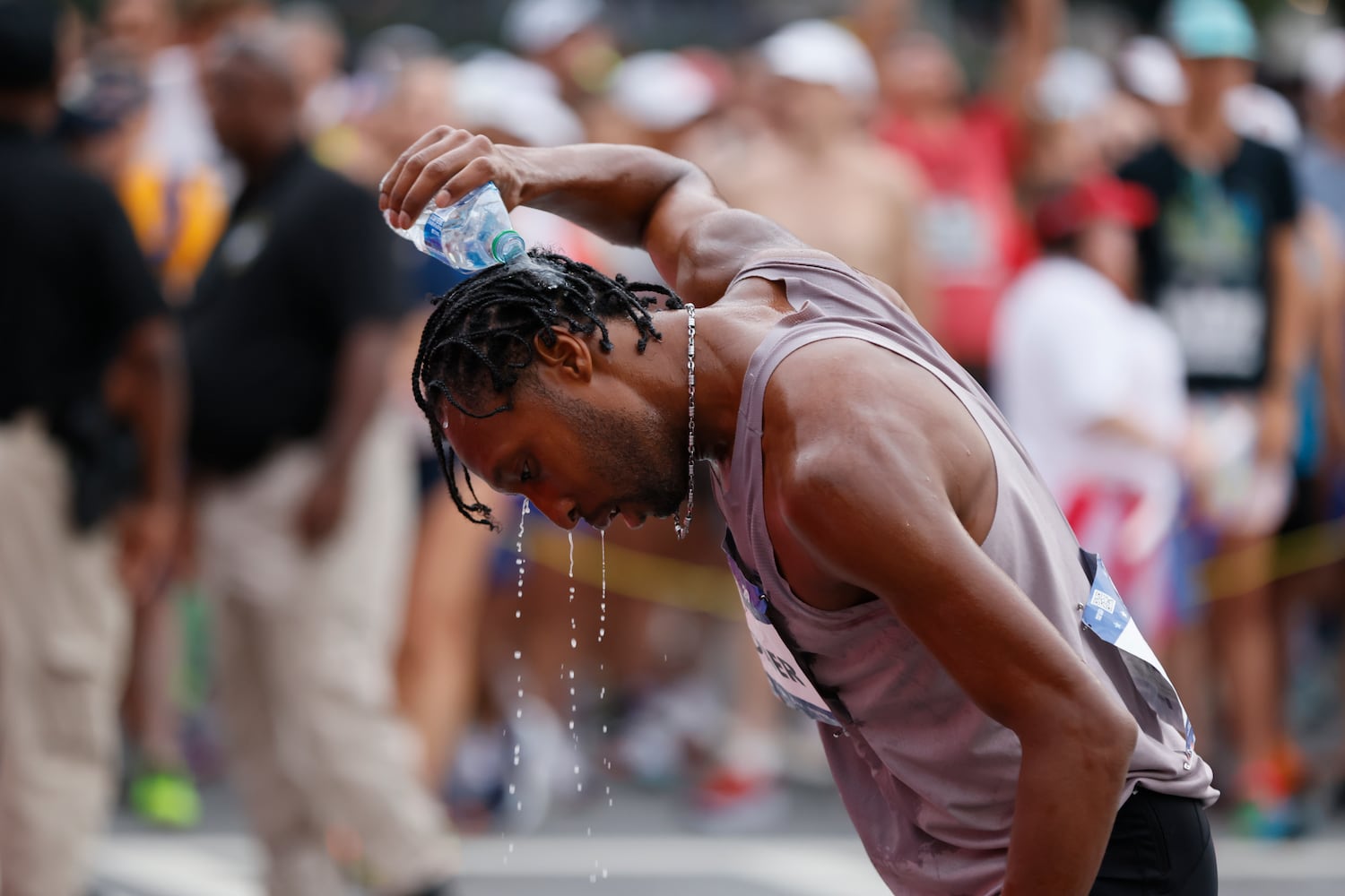 Elite men's runner Zacchaeus Widner prepares for the start of the 54th running of the Atlanta Journal-Constitution Peachtree Road Race in Atlanta on Tuesday, July 4, 2023.   (Arvin Temkar / Arvin.Temkar@ajc.com)