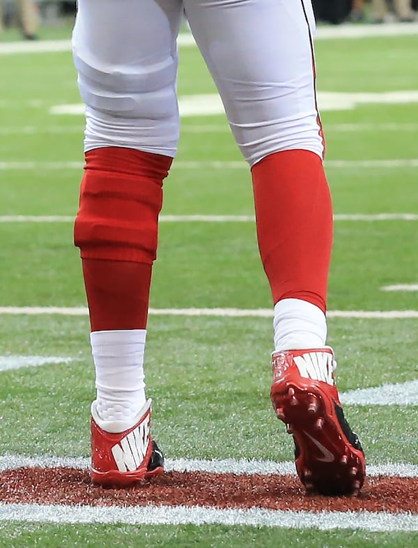 112215 ATLANTA: -- Falcons quarterback Matt Ryan is wearing a brace on his left leg under his uniform during the second half against the Colts in a football game on Sunday, Nov. 22, 2015, in Atlanta. Curtis Compton / ccompton@ajc.com