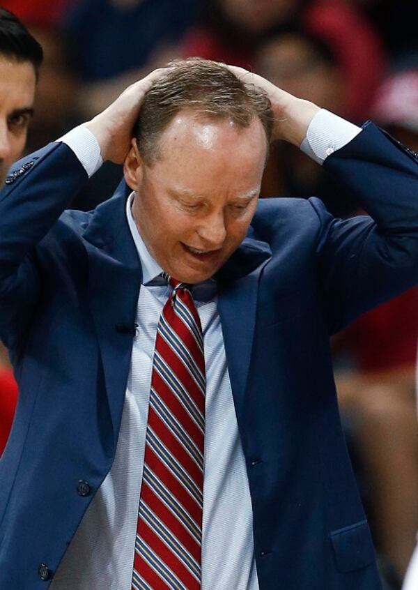 Atlanta Hawks coach Mike Budenholzer reacts during the second half of Game 2 of a first-round NBA playoff basketball playoff series against the Brooklyn Nets, Wednesday, April 22, 2015, in Atlanta. Atlanta won 96-91. (AP Photo/John Bazemore) The sky's not falling. Neither are the shots. (AP Photo/John Bazemore)