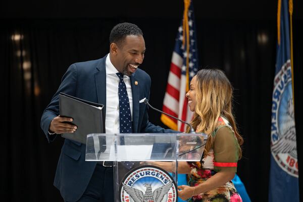 Phillana Williams, Director of the Mayor’s Office of Film & Entertainment at City of Atlanta, introduces Atlanta Mayor Andre Dickens to the podium at the Commencement Ceremony of the Rico Wade Music Executive Training Program in City Hall.