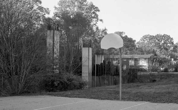 Highway supports rise next to the basketball court in Goldsboro Park. The supports were never used and eventually removed. Courtesy of Jeremy Fletcher