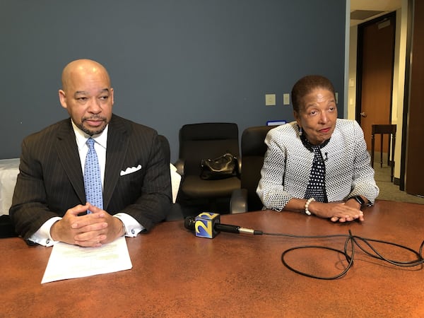 Attorney William Hill Jr., left, and former Atlanta Housing Authority CEO Renee Glover said Tuesday that they remain in an impasse with the authority over the payment of legal bills that they allege AHA should pay. J. SCOTT/STRUBEY@AJC.COM