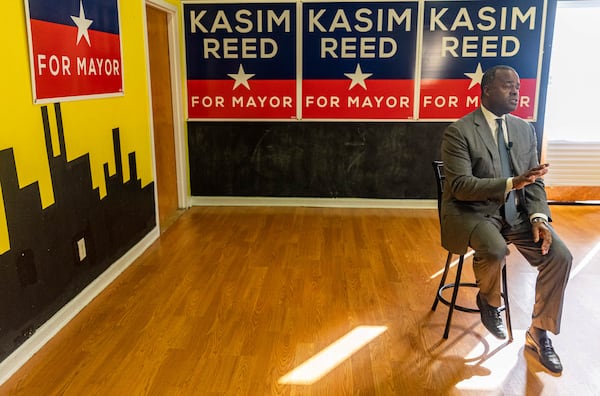 Former Atlanta Mayor Kasim Reed accepts an endorsement from the International Association of Fire Fighters Local 134 at Reed's campaign headquarters on Oct. 7, 2021.  (Jenni Girtman for The Atlanta Journal-Constitution)