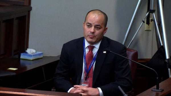 Cobb County detective David Raissi testifies at the murder trial of Justin Ross Harris at the Glynn County Courthouse in Brunswick, Ga., on Wednesday, Oct. 26, 2016. Raissi found it surprising that Harris used the term "malicious intent" after being told that he was being charged. (screen capture via WSB-TV)