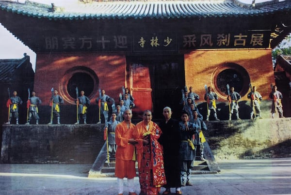 Shi DeRu (right) and Shi DeYang (left) with Shi SuXi (center)at the Shaolin Temple in 1991. Courtesy of Shaolin Institute