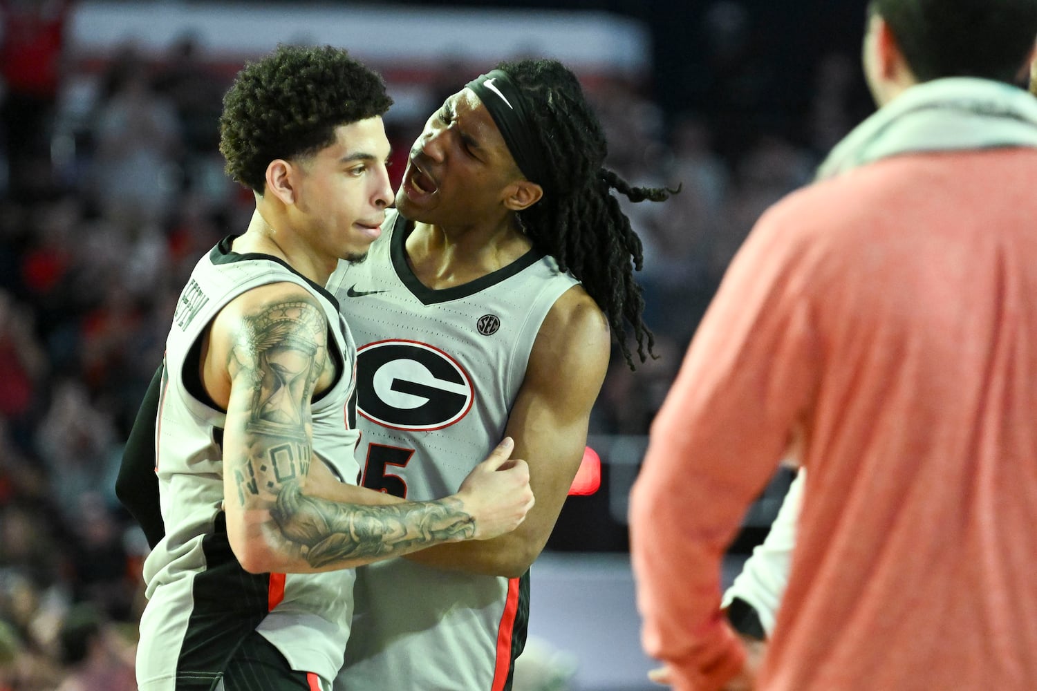 Georgia guard Silas Demary Jr. (5) reacts to layup by guard Dakota Leffew (1) during the second half of an NCAA Basketball game Saturday, March 8, 2025 at Stegeman Coliseum in Athens. Georgia beat Vanderbilt 79-68. (Daniel Varnado/For the Atlanta Journal-Constitution)