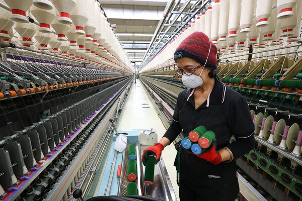 March 11, 2019 Jefferson: Asmarajati Djain works cleaning automated and faster specialty yawn spinning machines at Buhler Quality Yarns Corporation on Monday, March 11, 2019, in Jefferson. Curtis Compton/ccompton@ajc.com