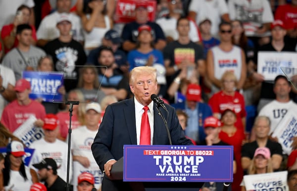 During his presidential campaign rally Saturday at the Georgia State University Convocation Center, former President Donald Trump praised State Election Board members Rick Jeffares, Janice Johnston and Janelle King. “They’re on fire," he said. "They’re doing a great job." The board last week voted unanimously to redo votes taken at a previous meeting that only Jeffares, Johnston and King attended after a lawsuit was filed alleging that meeting violated the Georgia Open Meetings Act. (Hyosub Shin / AJC)