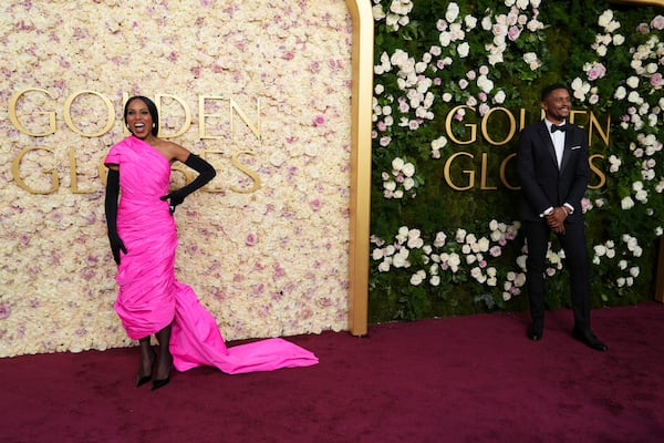 Kerry Washington, left, and Nnamdi Asomugha arrive at the 82nd Golden Globes on Sunday, Jan. 5, 2025, at the Beverly Hilton in Beverly Hills, Calif. (Photo by Jordan Strauss/Invision/AP)