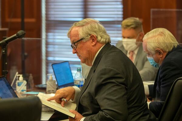 06/21/2021 — McDonough, Georgia — Attorney Bob Cheeley reads through Georgia law during a hearing on the motion to dismiss the case of the review of Fulton County elections ballots at the Henry County Courthouse in McDonough, Monday, June 21, 2021.(Alyssa Pointer / Alyssa.Pointer@ajc.com)

