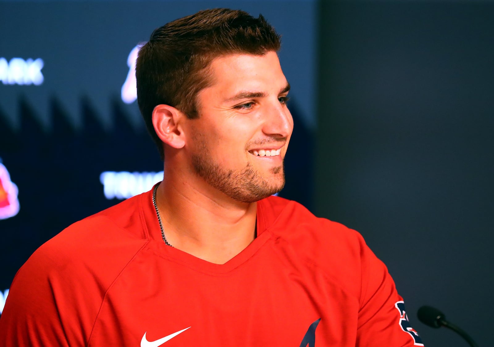 Braves third baseman Austin Riley breaks into a smile after arriving for his press conference after signing a 10-year, $212 million deal that runs through the 2032 season and includes a $20 million club option for 2033, on Tuesday, August 2, 2022, in Atlanta. Riley’s deal is the most lucrative in franchise history.   “Curtis Compton / Curtis Compton@ajc.com