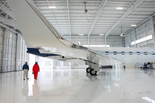 Fulton County representatives tour a newly renovated hanger at the Fulton County Executive Airport which represents of a larger effort to develop the area surrounding Fulton Industrial Blvd in Atlanta, Georgia on Thursday, April 11, 2024. (Olivia Bowdoin for the AJC). 