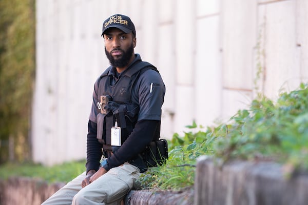 Assistant Chief Community Supervision Officer Andrew Houser says his job requires him to be part social worker, part counselor and part cop. “We give them the opportunity to make a change,” Houser he says. “We can’t make them not reoffend.” (Casey Sykes for the Atlanta Journal-Constitution)