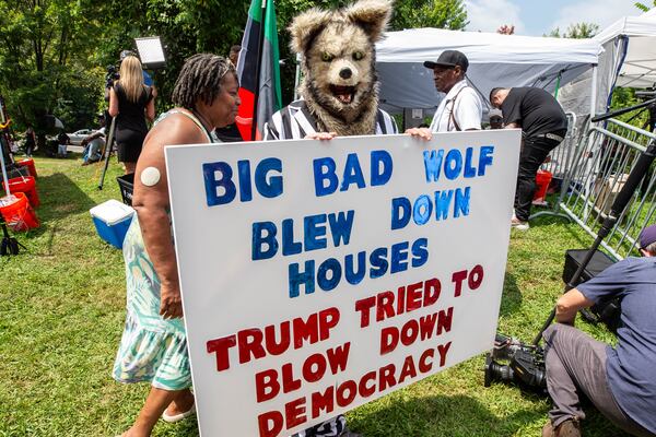 Protesters at the Fulton County Jail waiting for Trump’s arrival in Atlanta on Thursday, August 24, 2023. (Katelyn Myrick/katelyn.myrick@ajc.com)