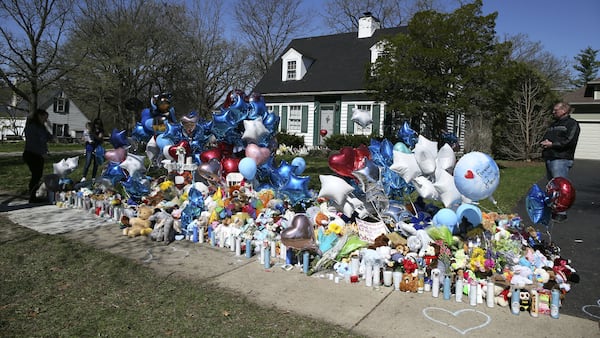 A memorial grows April 25, 2019, outside the Crystal Lake, Ill., home of Andrew "AJ" Freund Jr., 5, who was reported missing by his parents Thursday, April 18, 2019, in Crystal Lake, Ill. AJ’s body was found buried in a shallow grave April 24 and his parents, Andrew Freund Sr., 60, and JoAnn Cunningham, 36, have been charged with his murder.