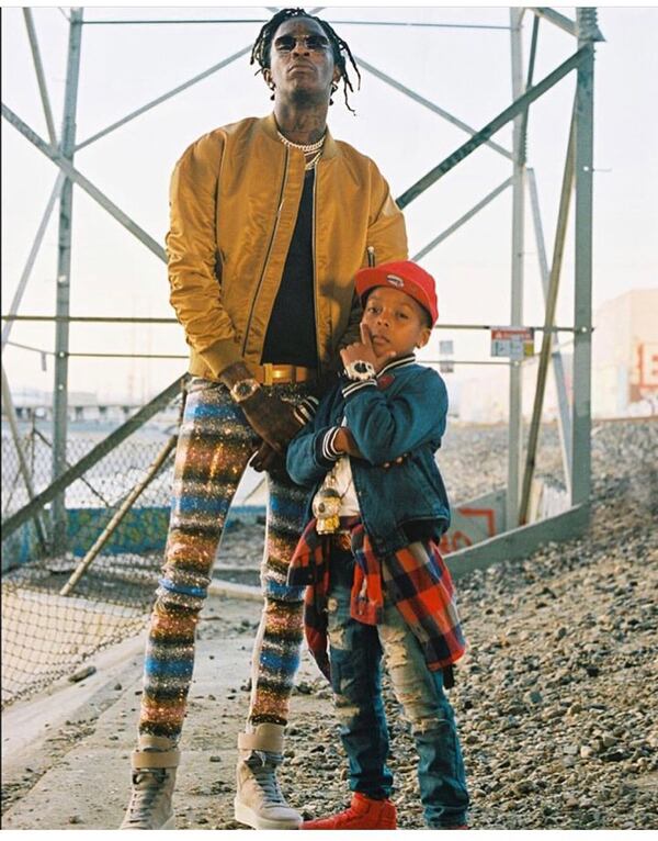 Corey Jackson, who raps as Lil C Note, poses with rap star Young Thug. (Courtesy of Patchwerk Recording Studios)