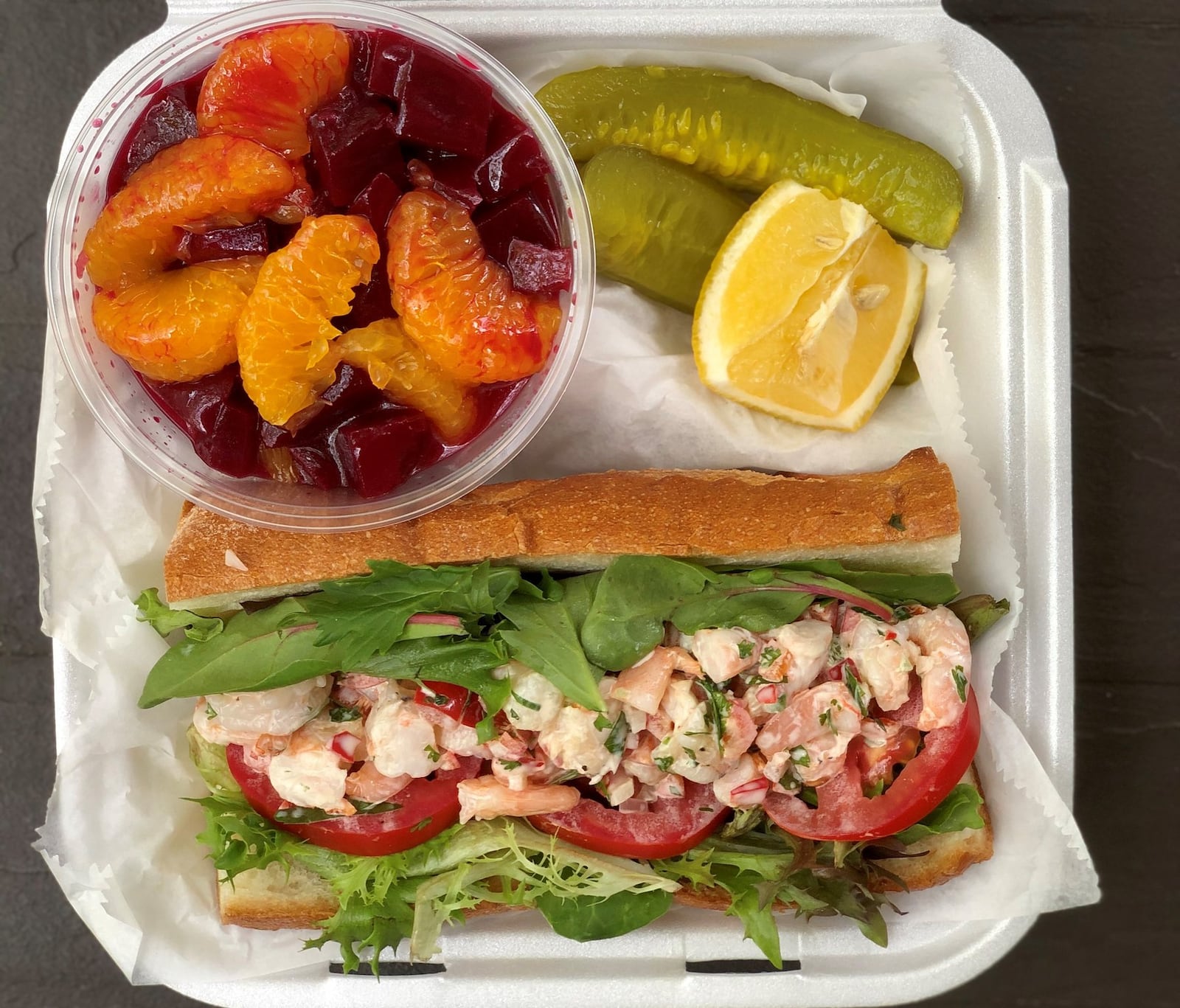 Cafe Lapin’s shrimp salad on French baguette with a side of beets and oranges. CONTRIBUTED BY WENDELL BROCK