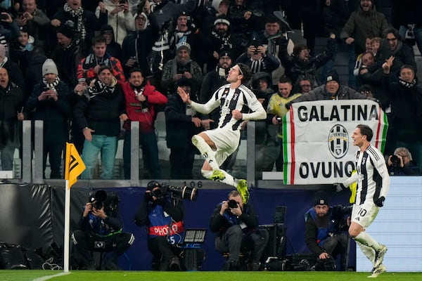 Juventus' Dusan Vlahovic celebrates after scoring his side's first goal during the Champions League, opening phase soccer match between Juventus and Manchester City at the Allianz stadium in Turin, Italy, Tuesday, Wednesday, Dec.11, 2024. (AP Photo/Luca Bruno)