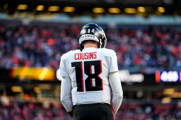 Atlanta Falcons quarterback Kirk Cousins (18) prepares for a play against the Denver Broncos during the second half of an NFL football game, Sunday, Nov. 17, 2024, in Denver. (AP Photo/Jack Dempsey)