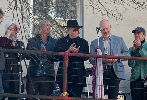 On Nov. 3, 2023, Monkees star Micky Dolenz (center) gets the key from Athens mayor Kelly Girtz (right of Girtz) while three members of R.E.M. join him: Michael Stipe, Peter Buck and Bill Berry. CONTRIBUTED/DIXIE TAYLOR