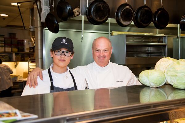 Restaurant Eugene’s Chef Linton Hopkins and son Linton Hopkins Jr. in the kitchen. CONTRIBUTED BY MIA YAKEL