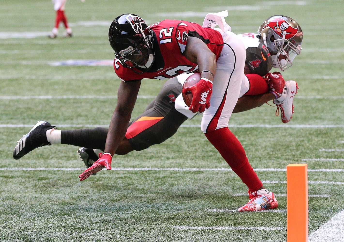 Falcons host Buccaneers under open roof